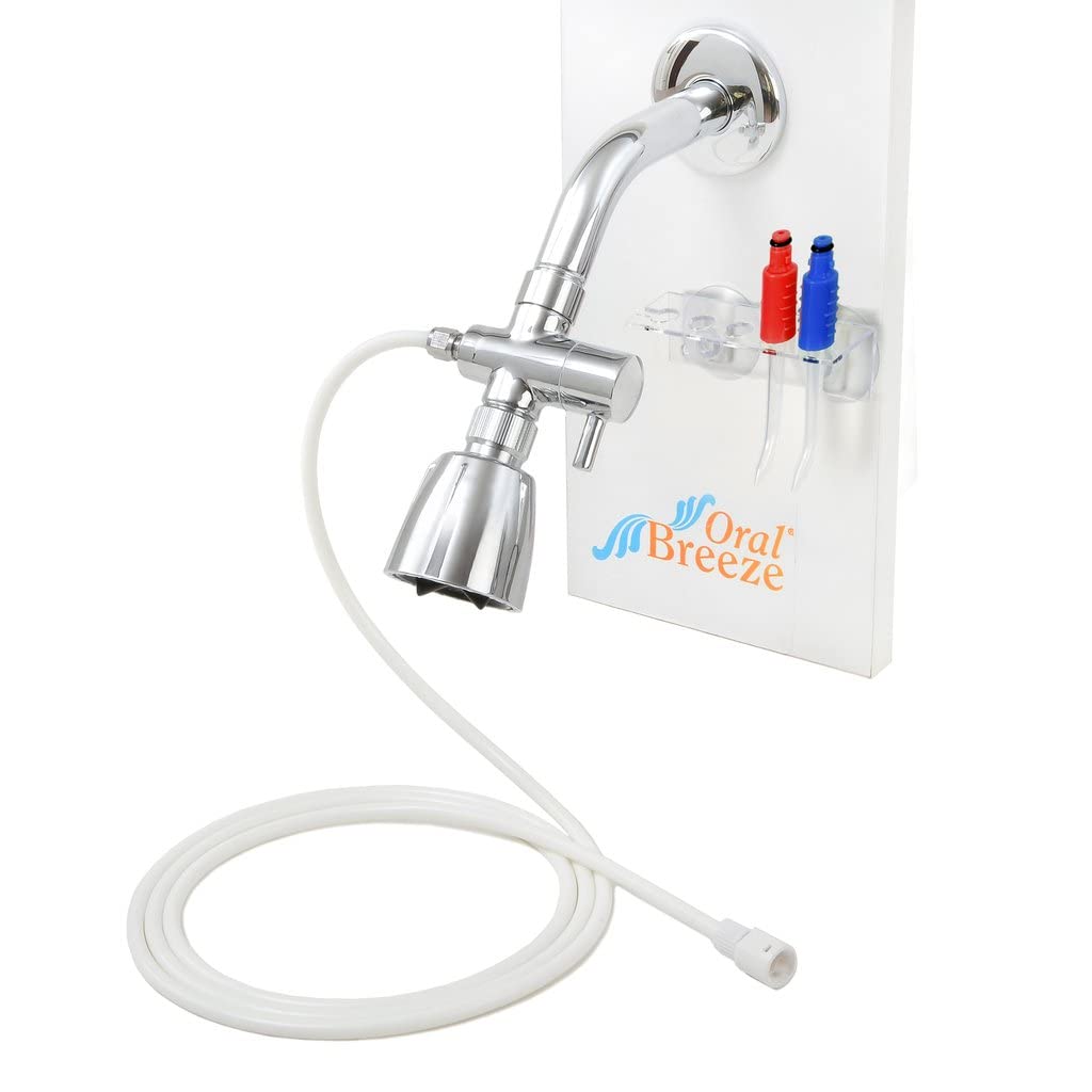 Irrigador dental a chorro de agua ShowerBreeze, trata la enfermedad...