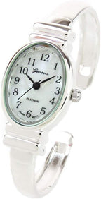 Reloj de pulsera de plata de tamaño pequeño con banda de metal ovalado para mujer de Ginebra