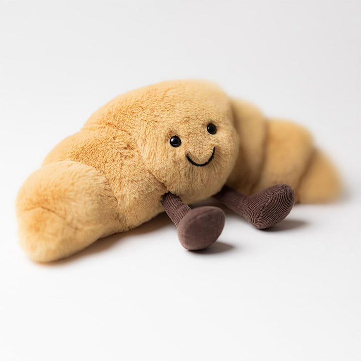Jellycat Amuseables - Juguete de peluche de croissant, pequeño de 8...