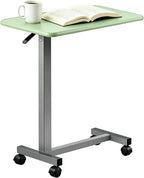 Mesa ajustable sobre cama con ruedas, color verde claro