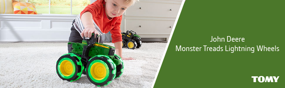 Monstruo John Deere con ruedas y huella iluminada Tractor