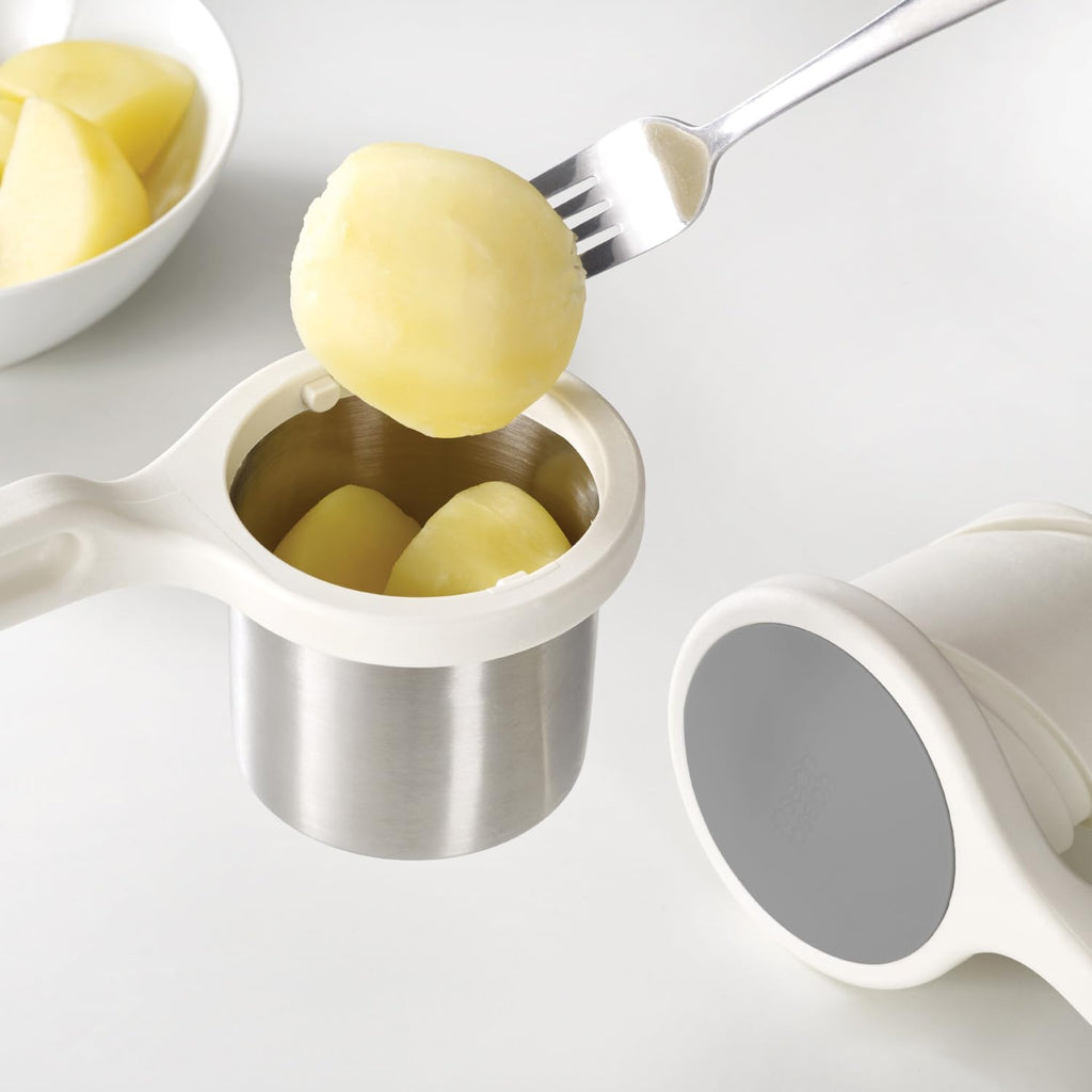 Exprimidor ergonómico, con giro, de acero inoxidable Joseph Joseph, (Potato Ricer), Blanco