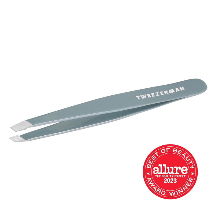 Tweezerman - Pinza para cejas inclinada Mist Blue de acero inoxidab...