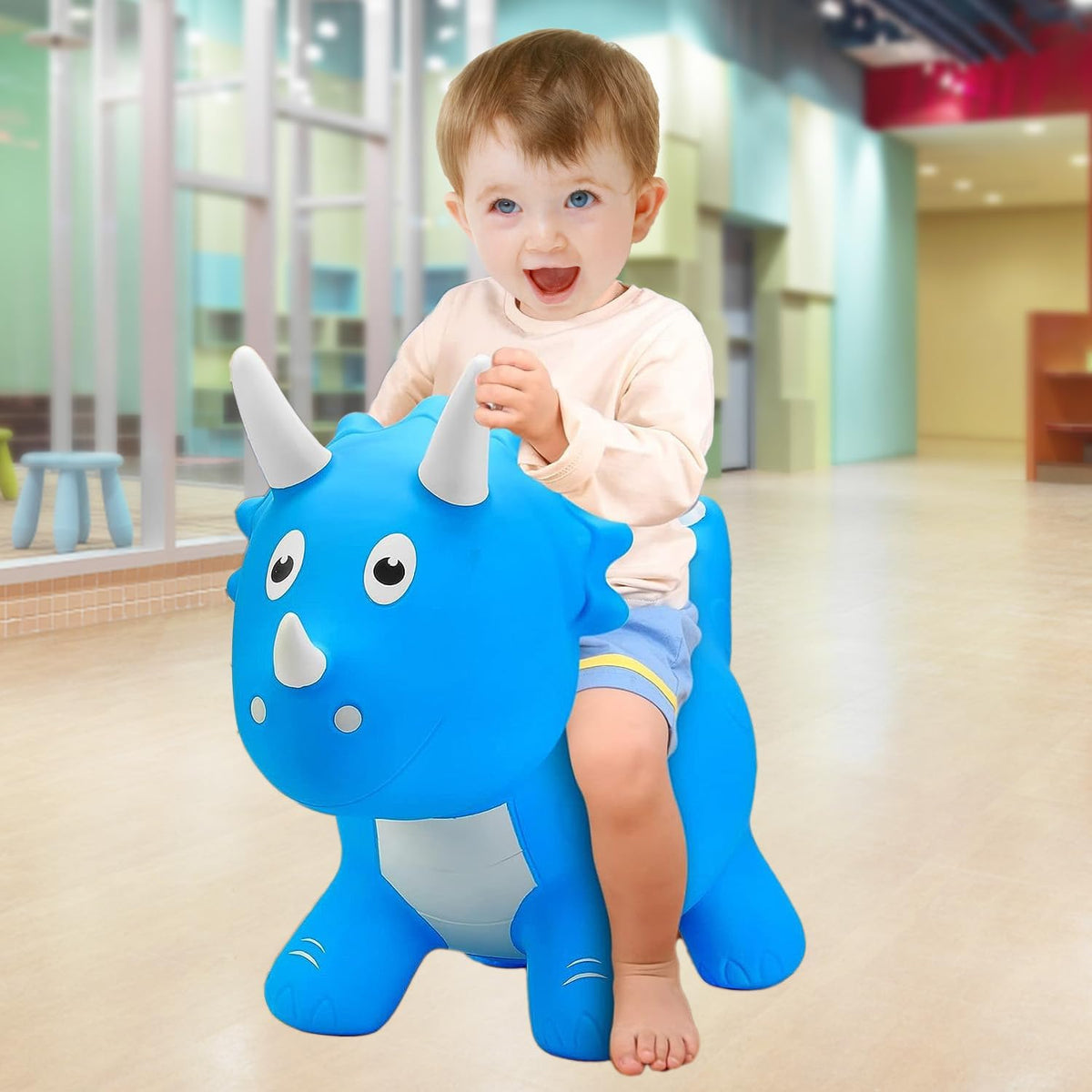 ZHUYNXIR Juguete inflable de dinosaurio animoso, juguete de dinosaurio saltador, juguete de salto favorito de los niños. Perfecto para cumpleaños (dinosaurio azul Hopper).