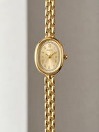 Reloj de pulsera para mujer con pantalla pequeña, cuarzo analógico ovalado de cara pequeña (Dorado)
