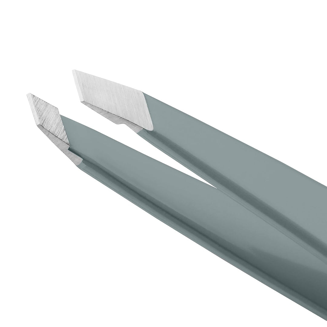 Tweezerman - Pinza para cejas inclinada Mist Blue de acero inoxidab...