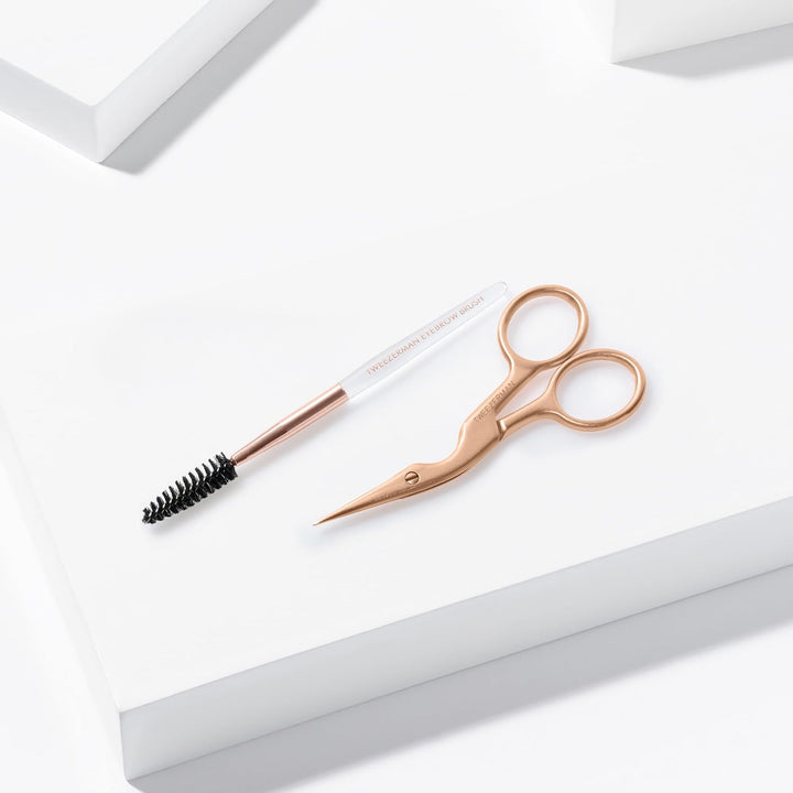 Tweezerman Tijera de cejas y cepillo de cejas de oro rosa