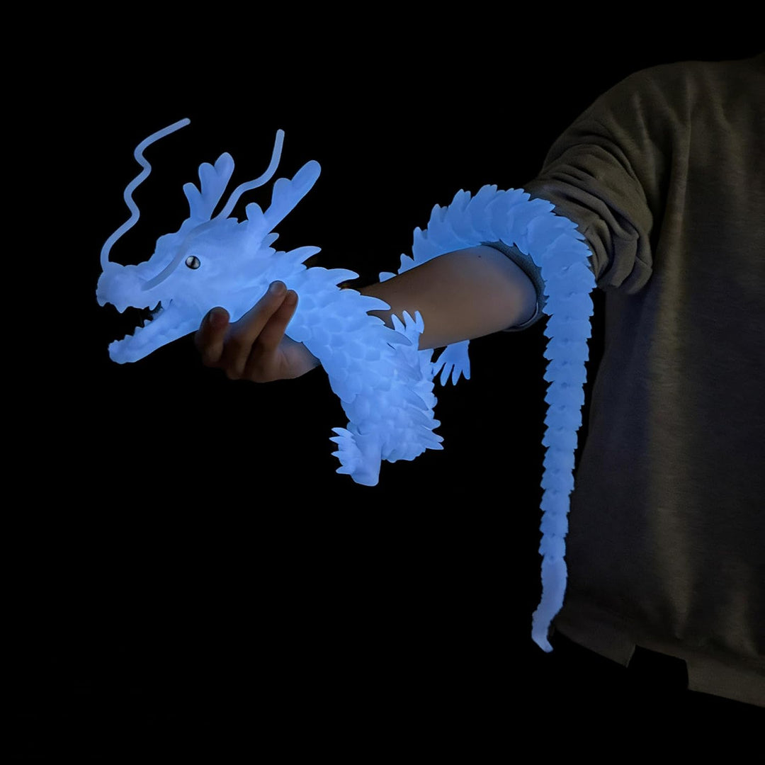Juguetes de dragón grandes impresos en 3D que brillan en la oscurid...