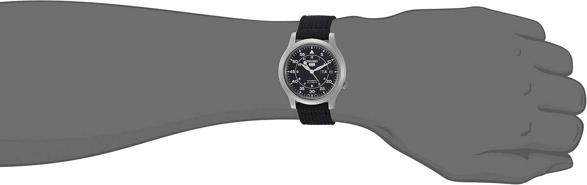 Seiko SNK809 reloj de acero inoxidable plateado automático con correa de lona negra para hombre