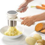 Exprimidor ergonómico, con giro, de acero inoxidable Joseph Joseph, (Potato Ricer), Blanco