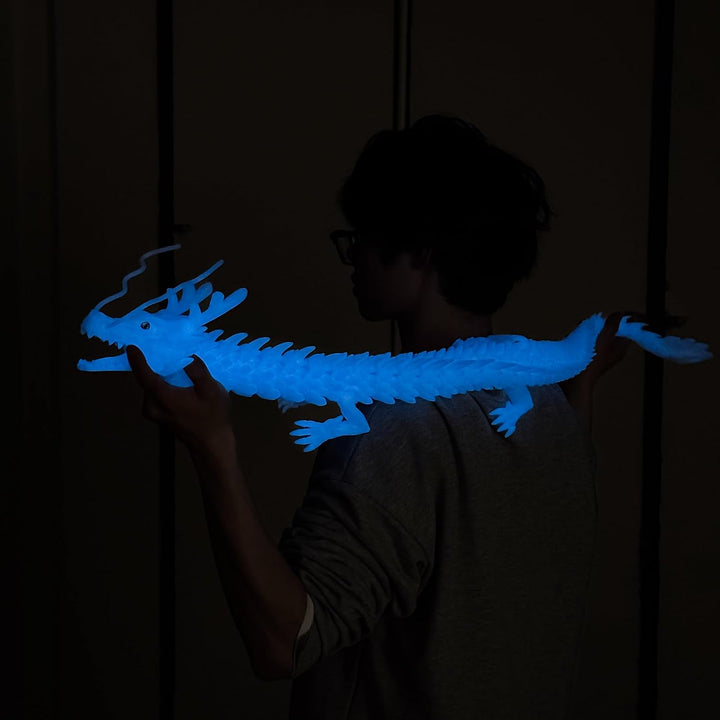 Juguetes de dragón grandes impresos en 3D que brillan en la oscurid...