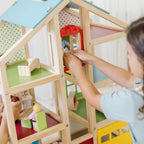 Melissa & Doug Casa de muñecas de madera Hi-Rise con muñecas y muebles de