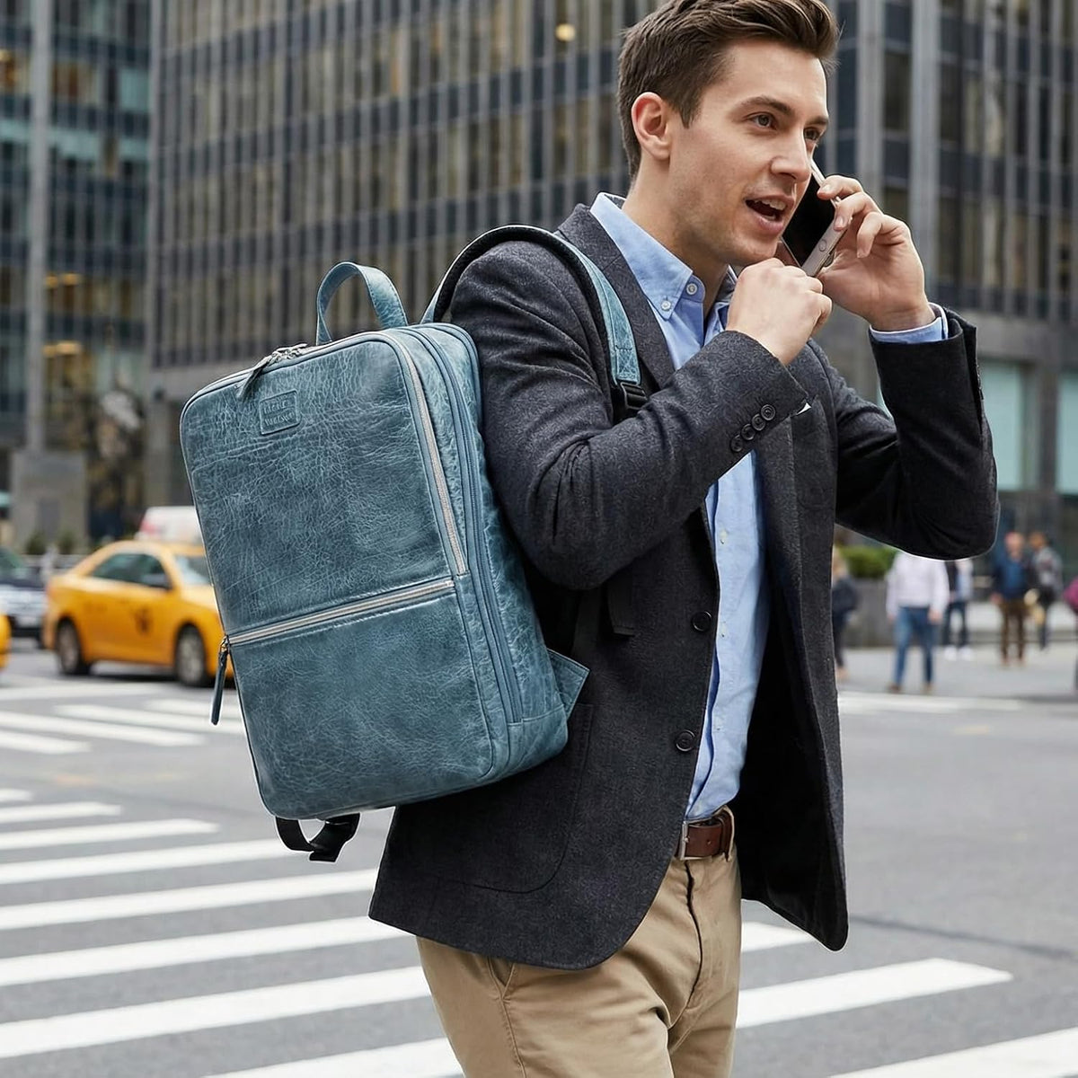 LEATHER VILLAGE Mochila de cuero para computadora portátil para hombres con correa de carretilla 16L Slim