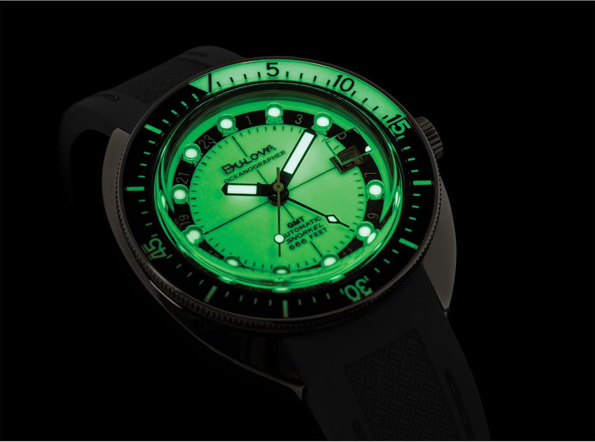 Bulova Reloj automático para hombre Oceanographer Snorkel GMT, caja de acero inoxidable gris ionizada, bisel giratorio unidireccional negro, correa de silicona gris, esfera blanca Estilo: 98B407