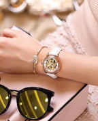 ROCOSJEWE Reloj de pulsera automático mecánico de lujo para mujer, esfera esqueletizada en oro rosado, manecillas luminiscentes, correa de cuero roja, reloj de vestir de moda para mujer, reloj esqueletizado autofaciente resistente al agua, regalo para