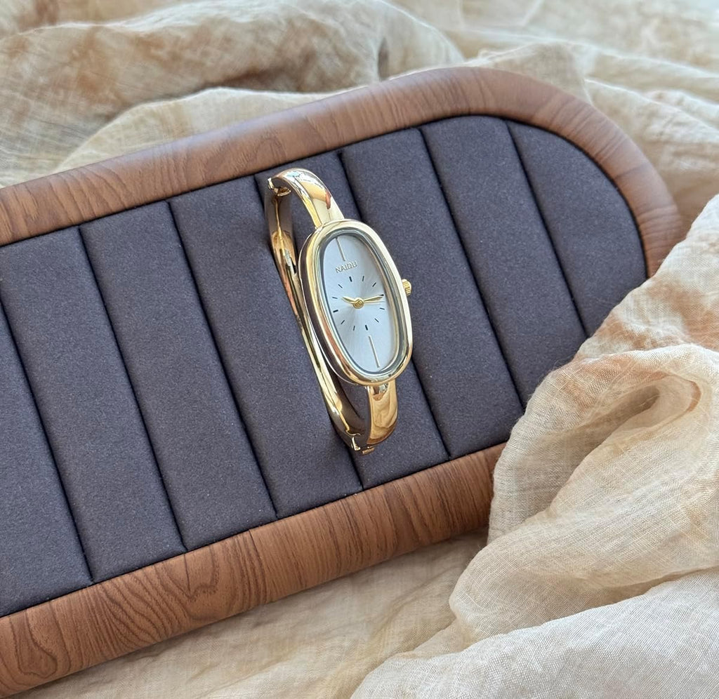 Reloj de pulsera minimalista con brazalete ovalado delicado para mujer