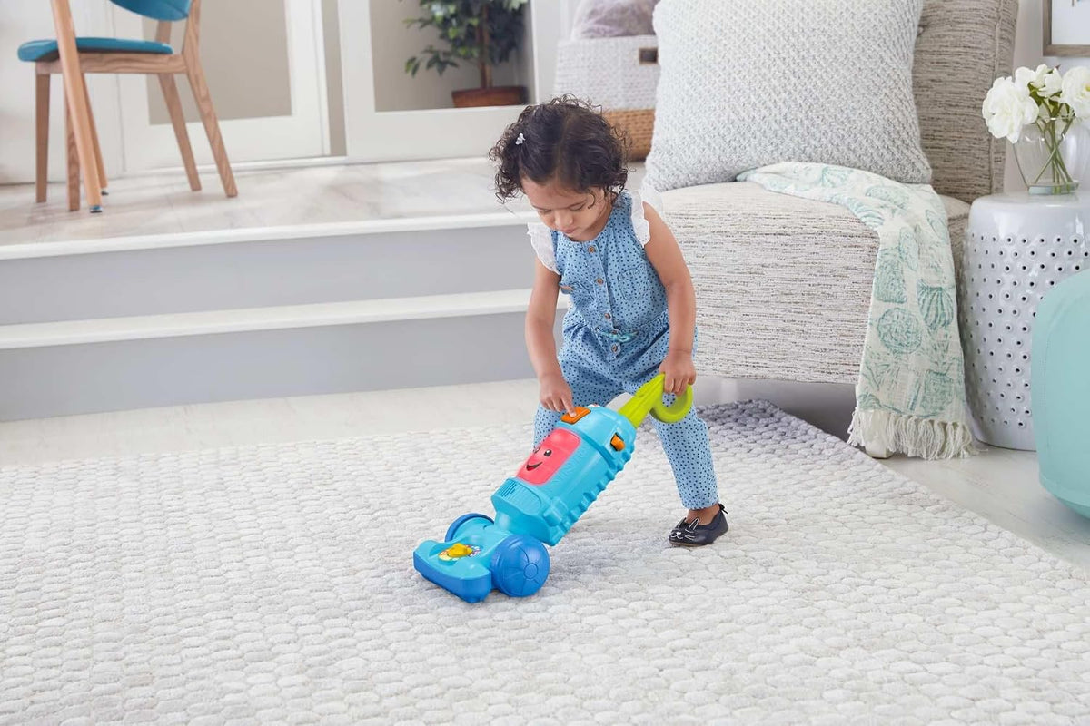 Fisher-Price - Aspiradora de juguete de la serie Laugh & Learn