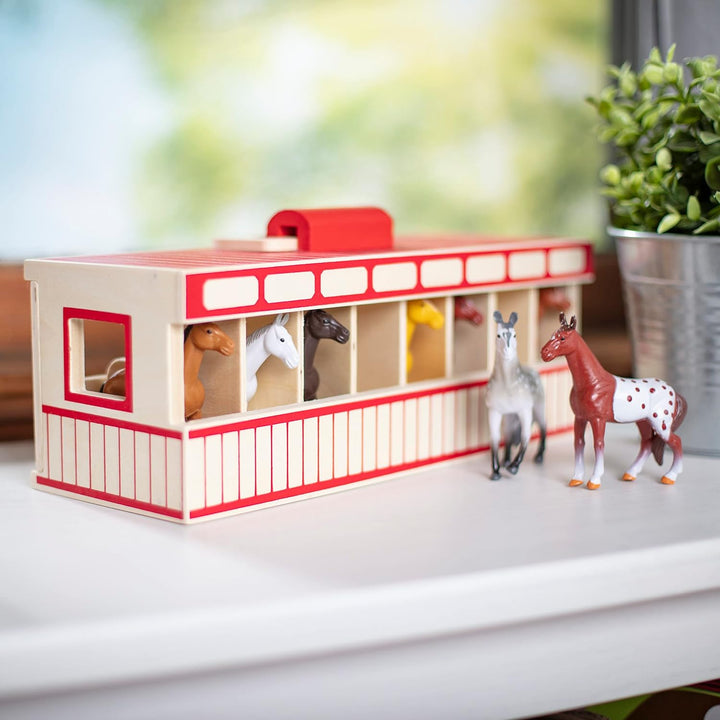 Establo de madera de juguete con 8 caballos, de Melissa &amp; Doug