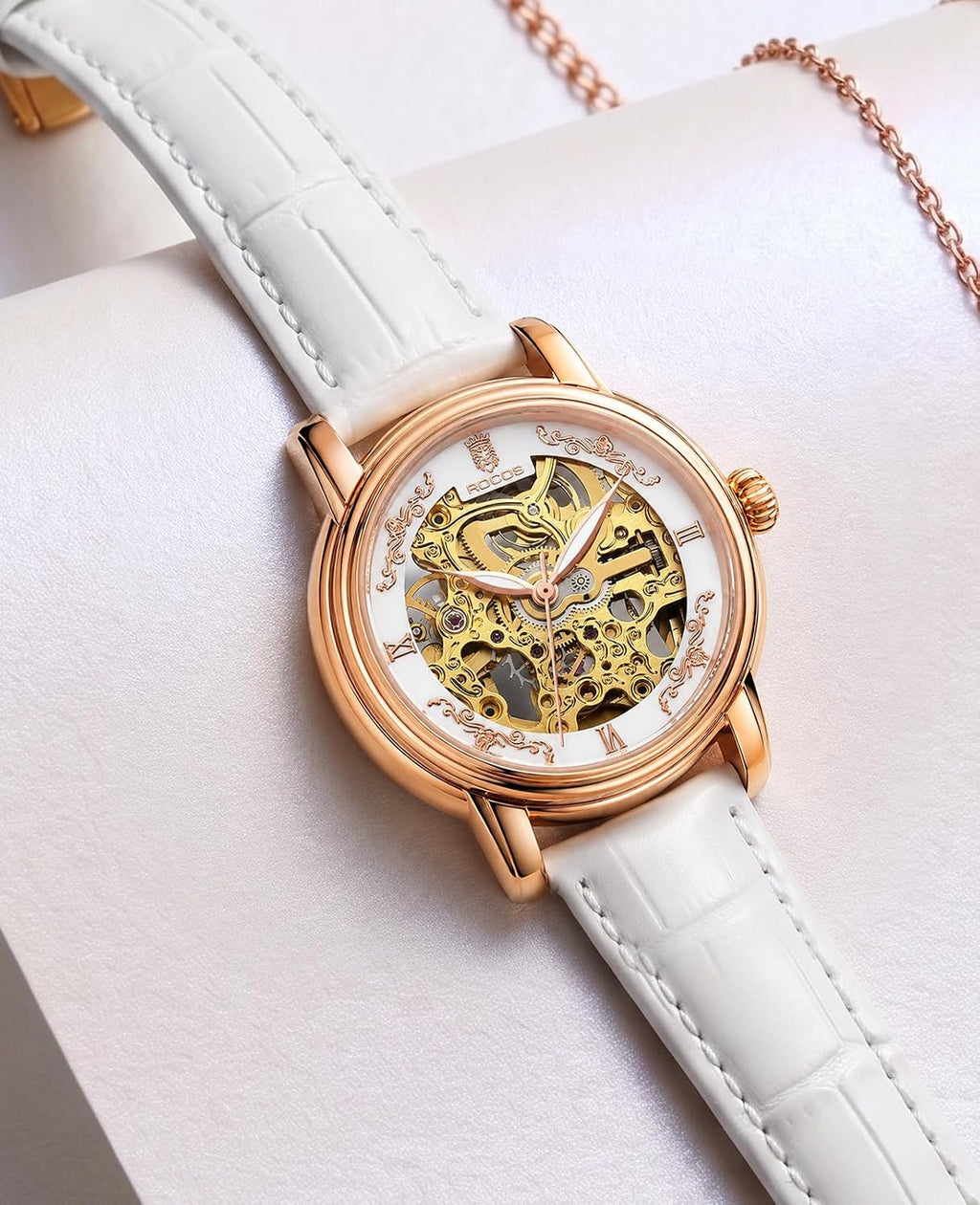ROCOSJEWE Reloj de pulsera automático mecánico de lujo para mujer, esfera esqueletizada en oro rosado, manecillas luminiscentes, correa de cuero roja, reloj de vestir de moda para mujer, reloj esqueletizado autofaciente resistente al agua, regalo para