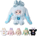 Nommi - Caja ciega de peluche con 3 expresiones (al azar 1)