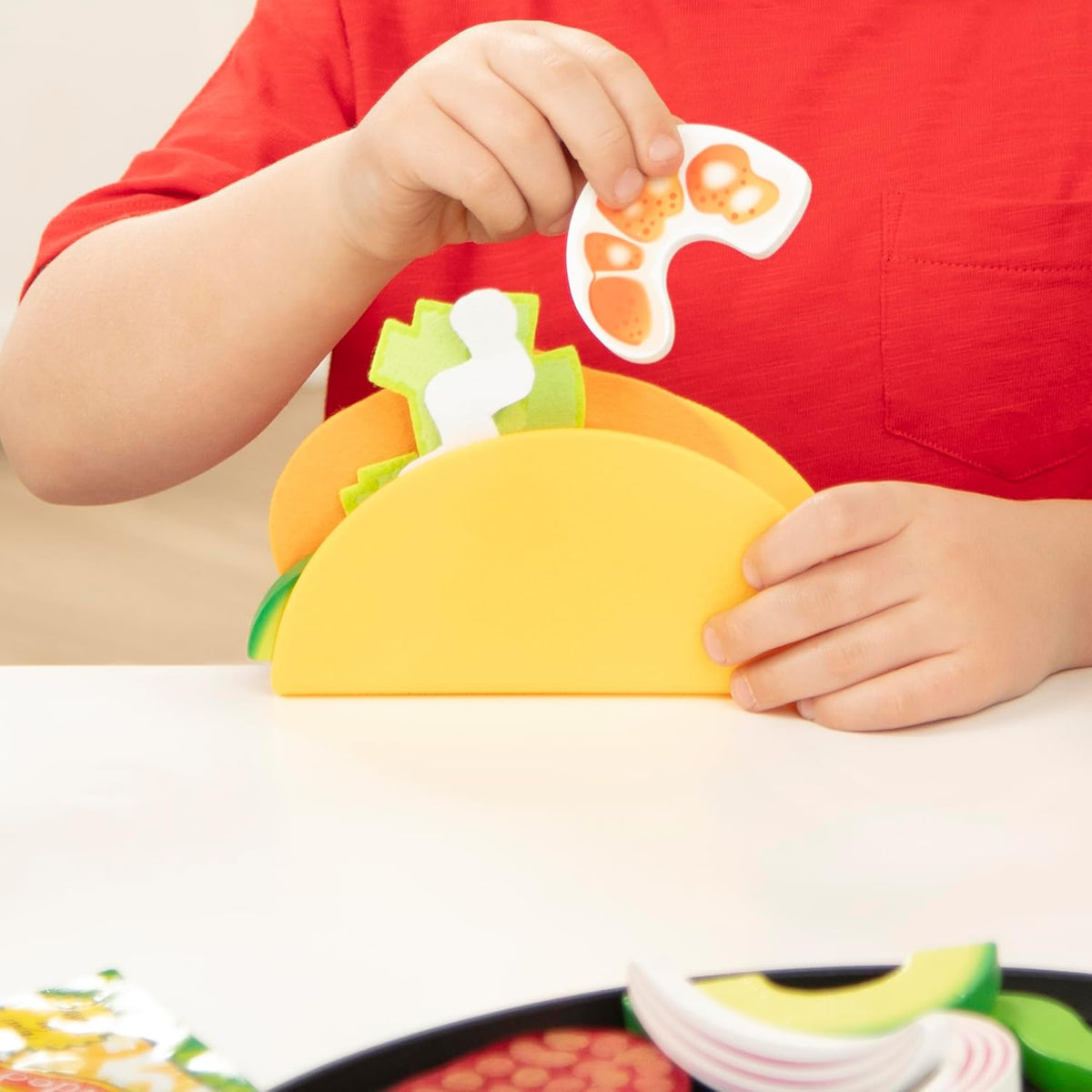 Melissa & Doug Fill & Fold - Juego de tacos y tortillas