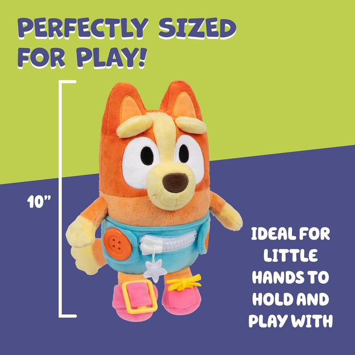 Dress &amp; Play Baby Bingo Bluey de Peluche, Botón, Cremallera, He...