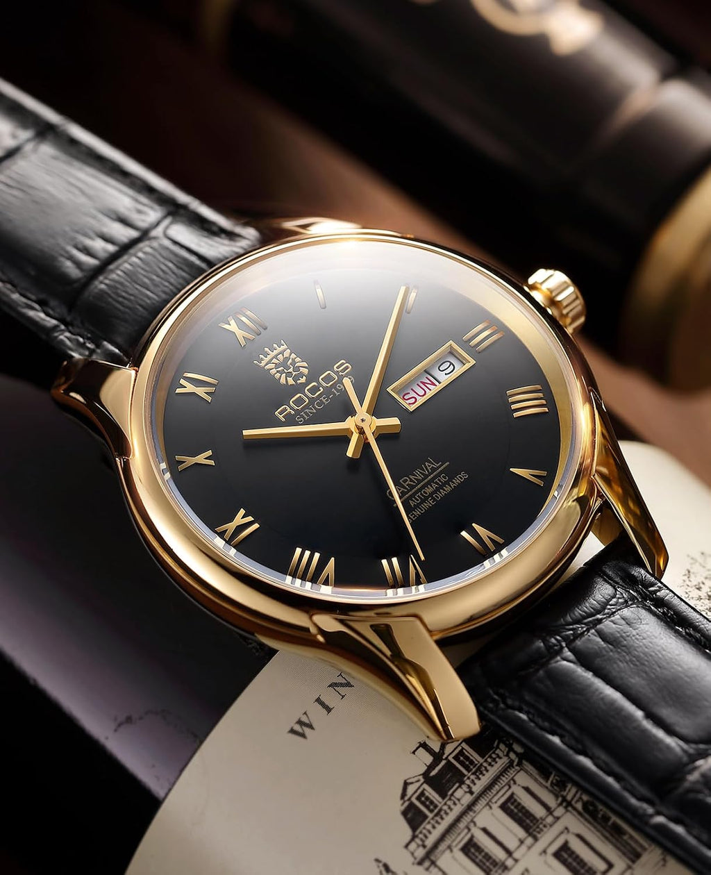 ROCOSJEWE Reloj de vestir masculino automático de cuerda automática - Caja de acero inoxidable dorado, números romanos, correa de cuero marrón, indicación de día y fecha, tapa esqueletada, reloj de pulsera de lujo para negocios, uso casual y diario