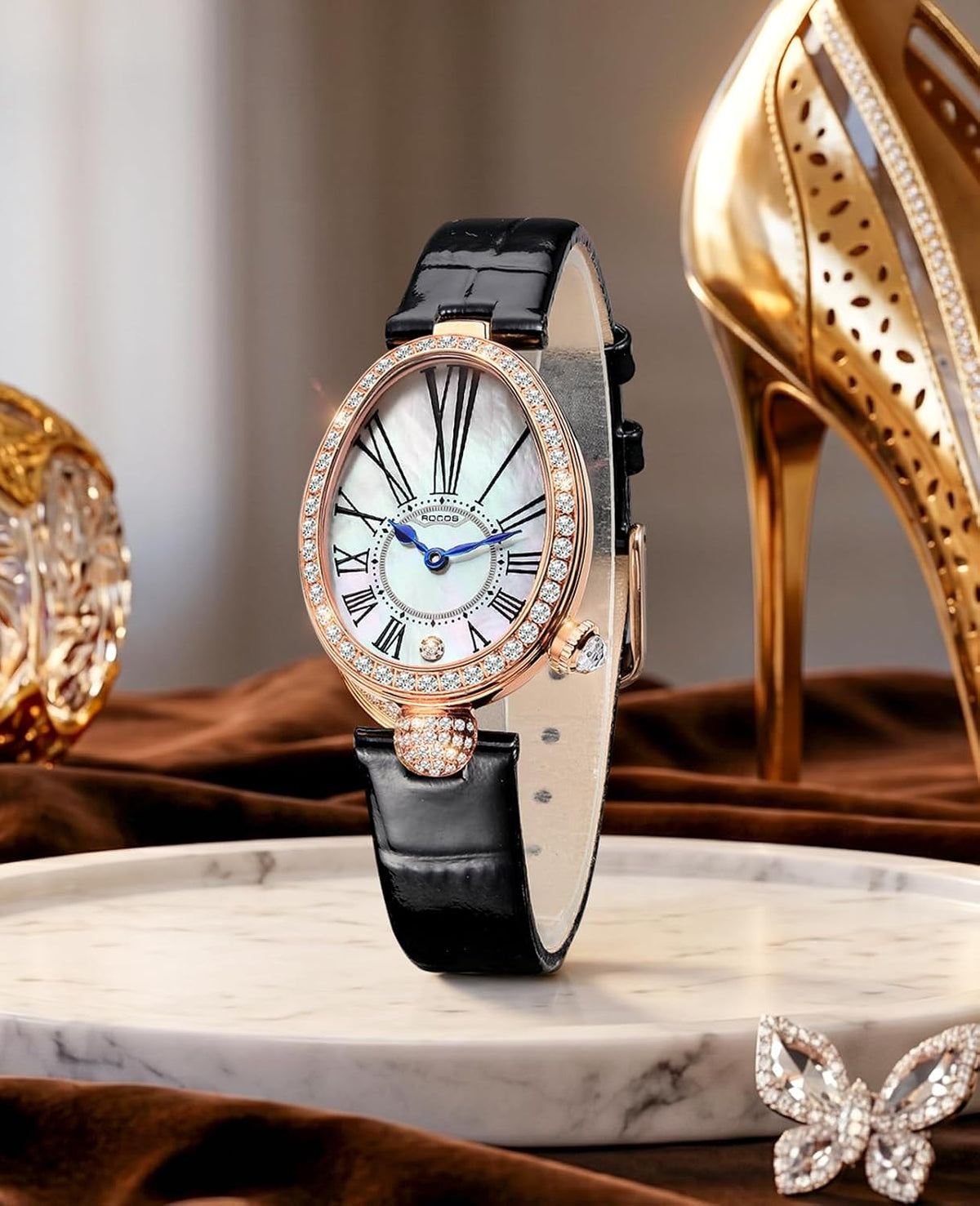 ROCOSJEWE R0233 Reloj Vintage de Lujo para Mujer — Reloj Ovalado para Dama, Números Románicos Irregulares, Caja en Oro Rosa, Correa de Cuero Marrón Oscuro/Negro, Resistente al Agua, Relojes de Moda para Mujer de Vestir