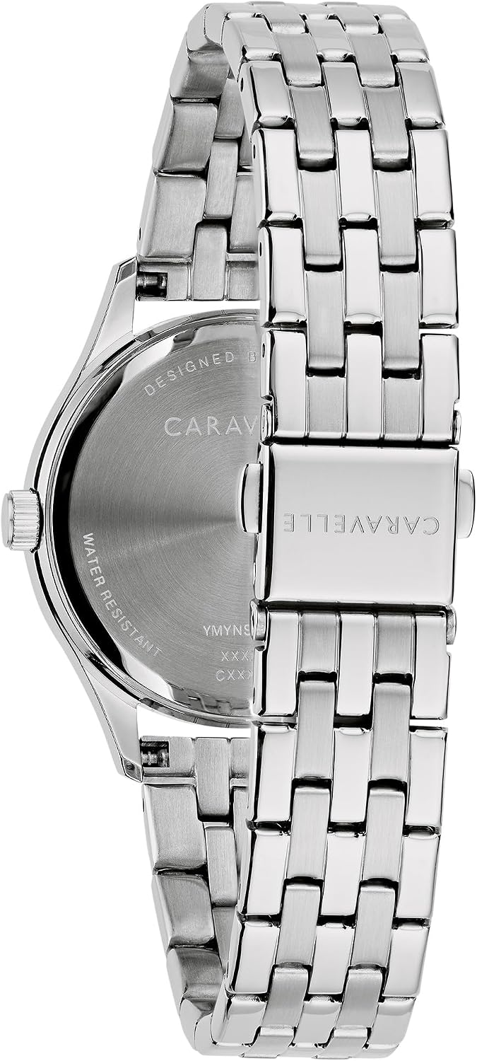 Caravelle by Bulova Reloj clásico de mujer con calendario día-fecha, borde tipo moneda, 3 manecillas, cuarzo