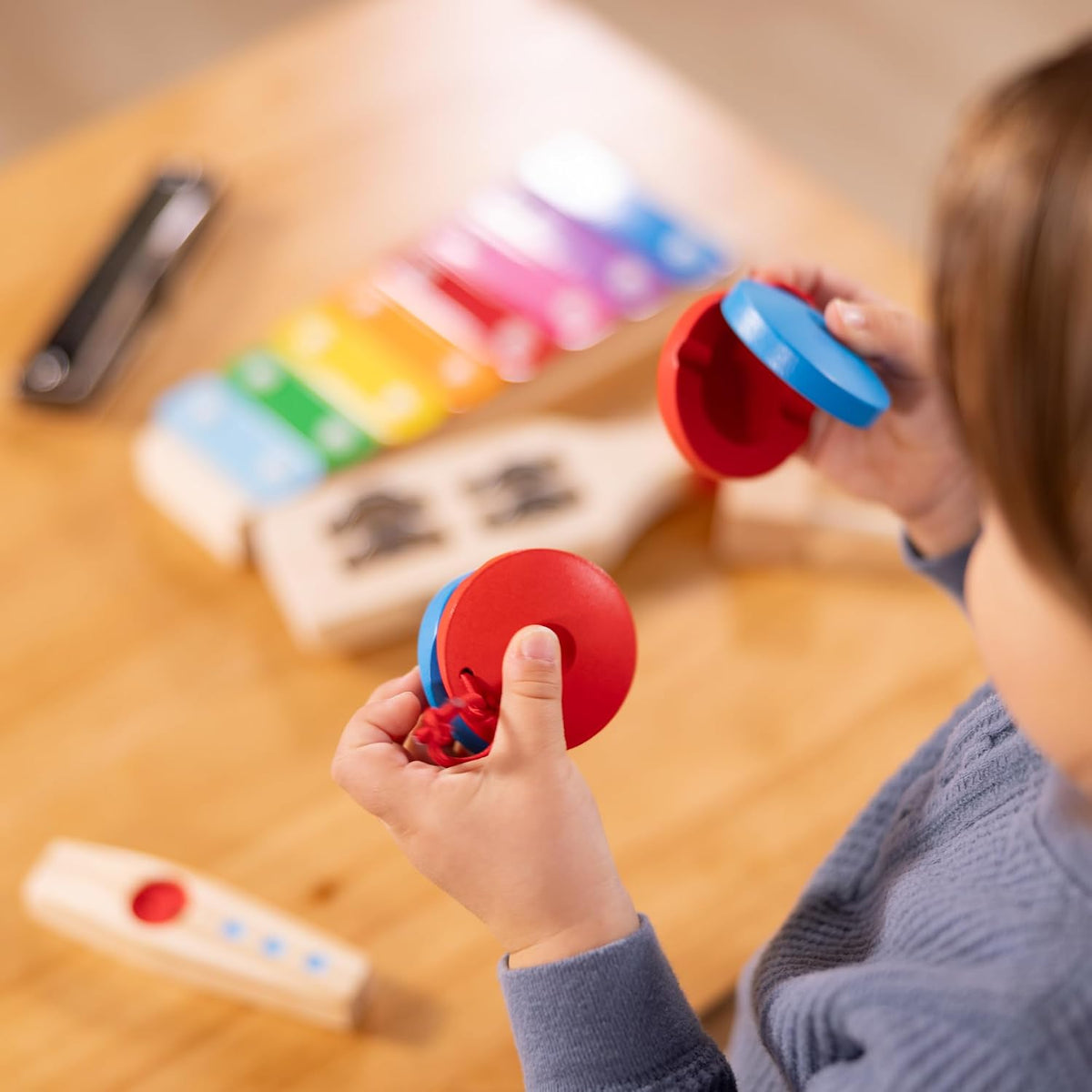 Melissa & Doug Band-in-a-Box - Juego de instrumentos de madera de 7 piezas