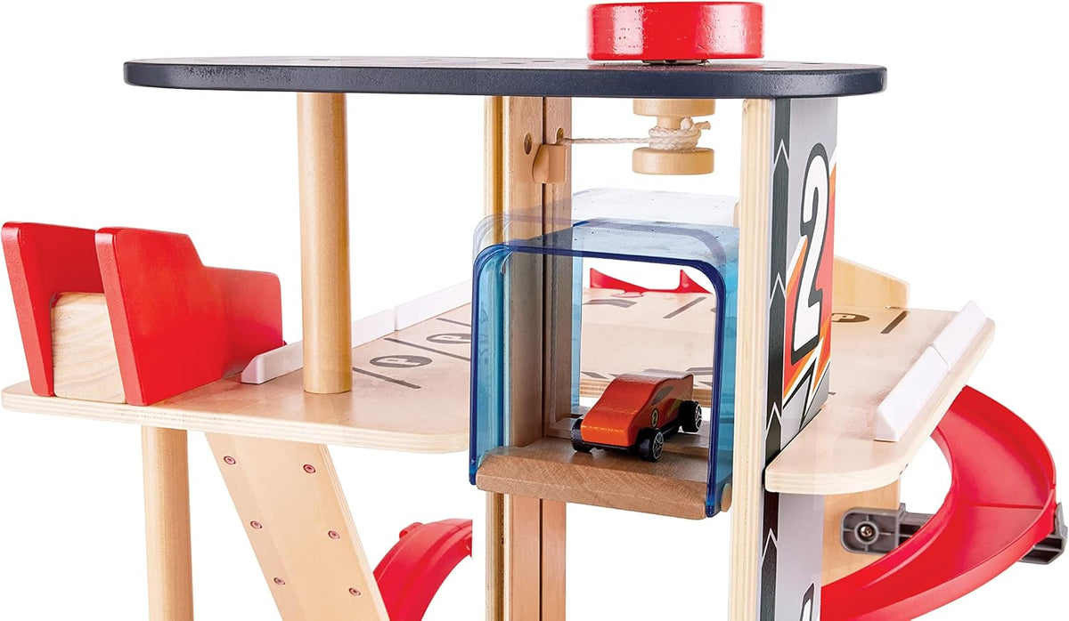 Hape Gearhead Stunt Garage - Juego de Garaje de Estacionamiento de Autos de Juguete de Madera para Niños con Ascensor y 2 Pistas de Salida, Bucle Desmontable, Incluye 2 Autos de Carreras de Juguete de