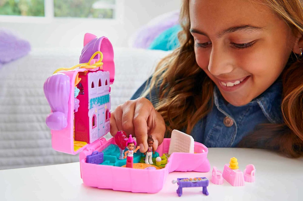 Polly Pocket Juego compacto, fiesta de piñata con 2 micro muñecas y accesorios, juguetes de viaje con revelaciones sorpresa