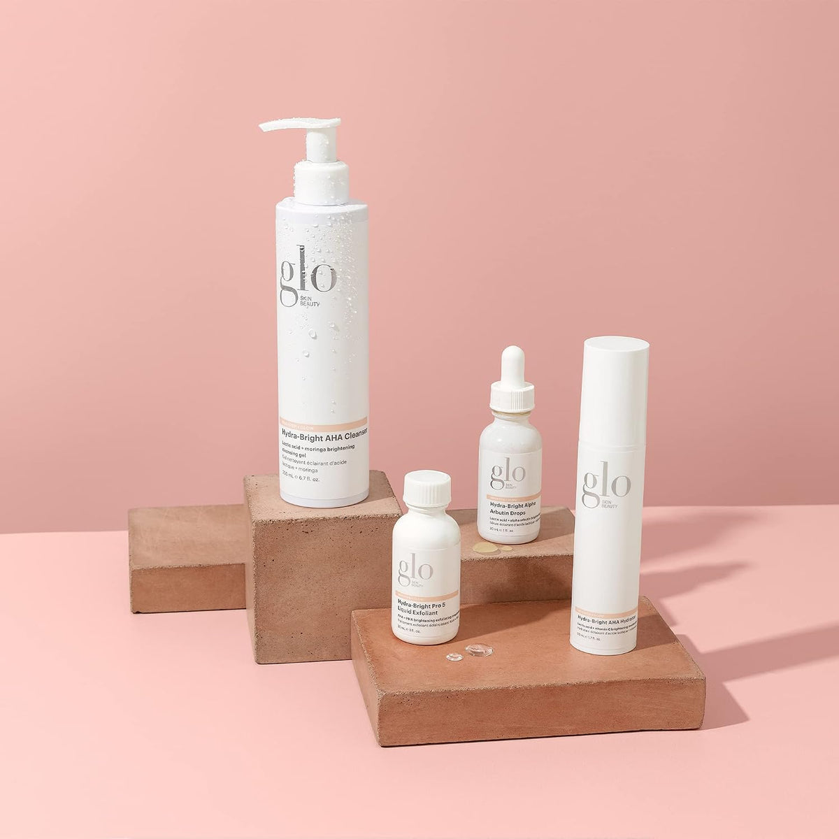 Glo Skin Beauty Juego de elementos esenciales elevados Brighten + G...