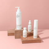 Glo Skin Beauty Juego de elementos esenciales elevados Brighten + G...