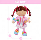 June Garden Dressy Friends Daisy de 15.5 pulgadas, muñeca de peluche educativa para niños y niños pequeños de 2 años en adelante, juguete suave con hebilla Montessori