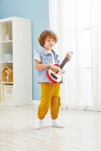 Hape Aprende con luces Ukelele electrónico rojo | Modo de inclinación y banda | Instrumento musical