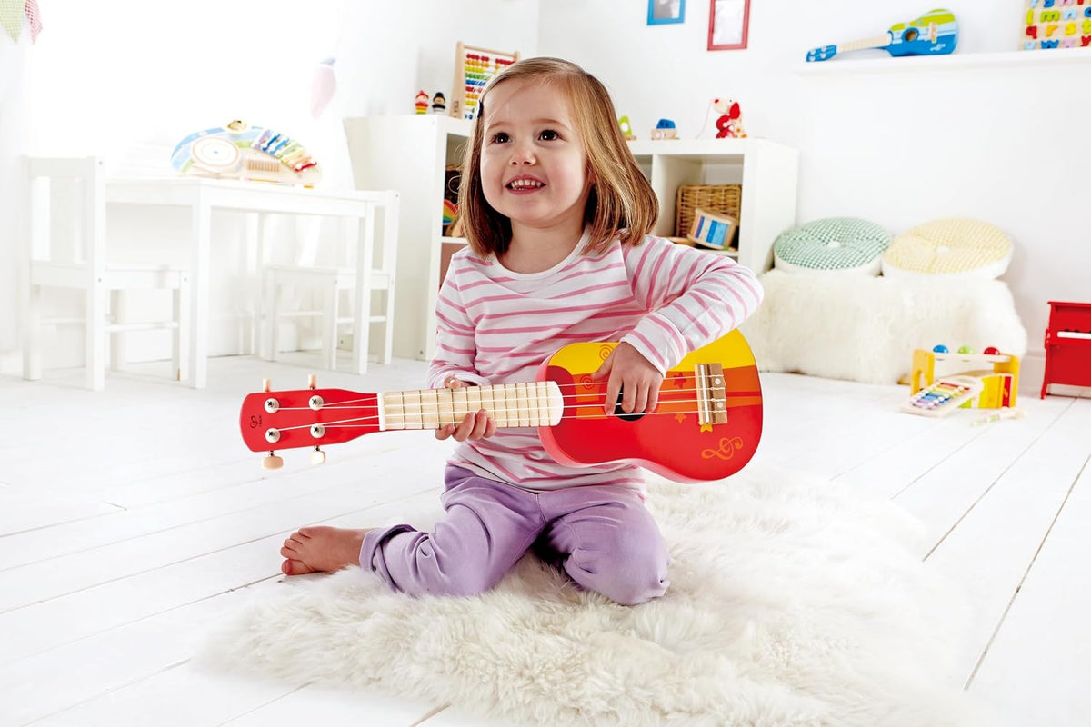 Hape - Ukelele de juguete de madera para niños, rojo