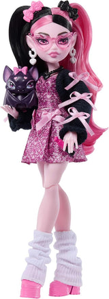 Muñeca Monster High, Draculaura en vestido de lazo rosa y chaqueta...