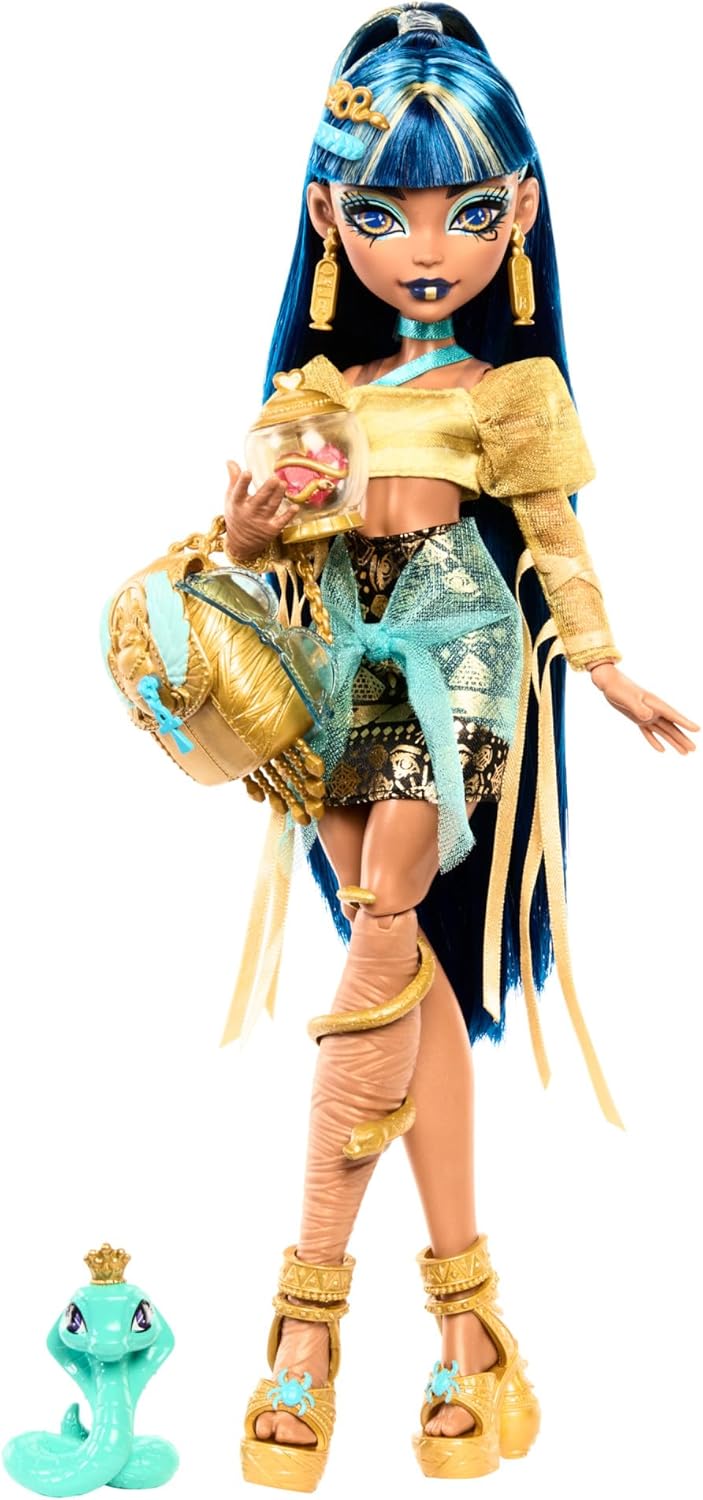 Muñeca Monster High Cleo De Nile con blusa dorada y falda de capas,...