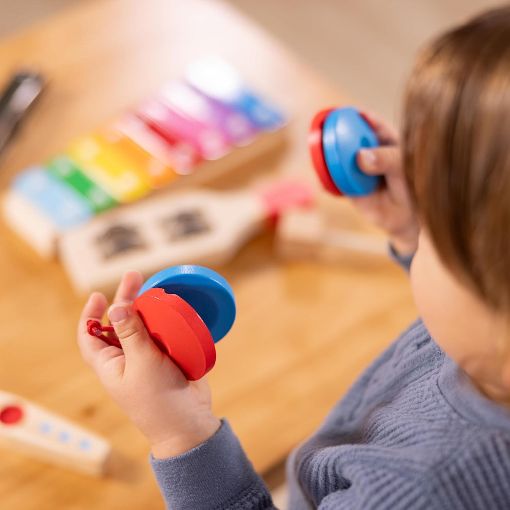 Melissa & Doug Band-in-a-Box - Juego de instrumentos de madera de 7 piezas