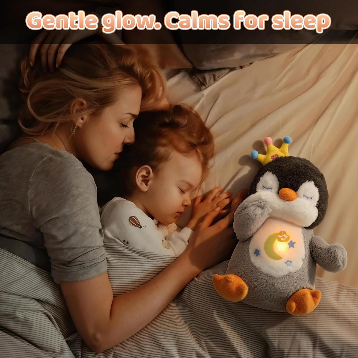 Peluche de pingüino que respira con música suave y ligera para