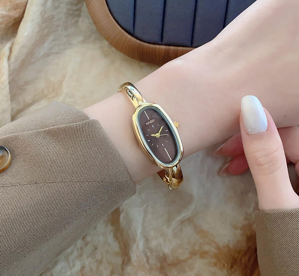 Reloj de pulsera minimalista con brazalete ovalado delicado para mujer