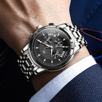 OLEVS Relojes para Hombre de Lujo a prueba de agua Lúminosos de lectura fácil Cronógrafo Con Esmalte Dorado Completo / Blanco Dial / Cara Negra Calendario Pulsera Relojes