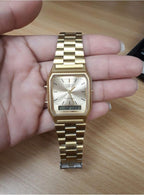 Casio AQ230GA-9D Reloj analógico digital de doble hora con banda de metal en tono dorado para hombre, Oro, Reloj analógico, digital