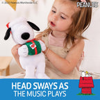 Kids Preferred Peanuts Snoopy de Peluche Musical con Movimiento, Reproduce Jingle Bells, Detalles Bordados, Peluche Suave para Bebés y Niños Pequeños, Niños y Niñas