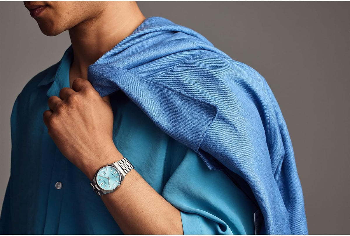 CITIZEN TSUYOSA Reloj automático de pulsera de acero inoxidable y esfera azul cielo 1.575 in NJ0151-53M