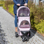Trixie Cochecito plegable para mascotas para gatos y perros, carrito transportador de mascotas con cubierta climática, cesta de almacenamiento, soporte para tazas, rosa