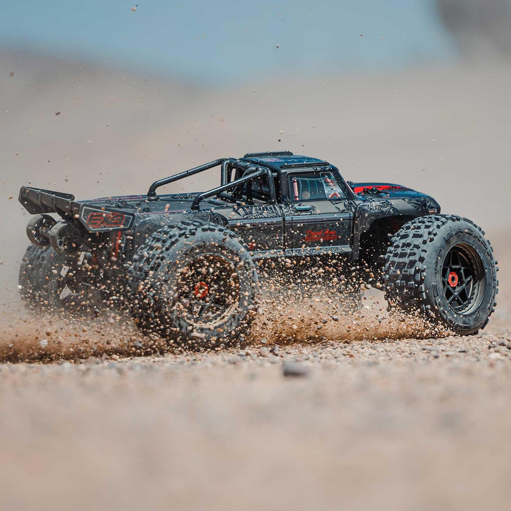 ARRMA Camión RC Outcast 4X4 8S BLX 1/5 Camión de Acrobacias Negro RTR (Transmisor y Receptor Incluidos, Batería y Cargador No Incluidos) ARA5810V2T1