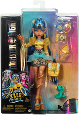 Muñeca Monster High Cleo De Nile con blusa dorada y falda de capas,...