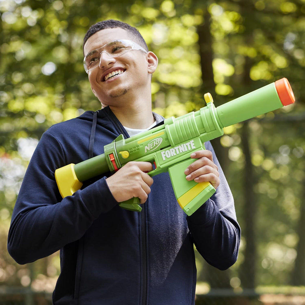Nerf Fortnite SMG-Zesty Blaster, 10 Dardos Nerf Elite, Cargador de 10 Dardos, Culata y Cañón Removibles, Regalos Fortnite para Boys & Girls
